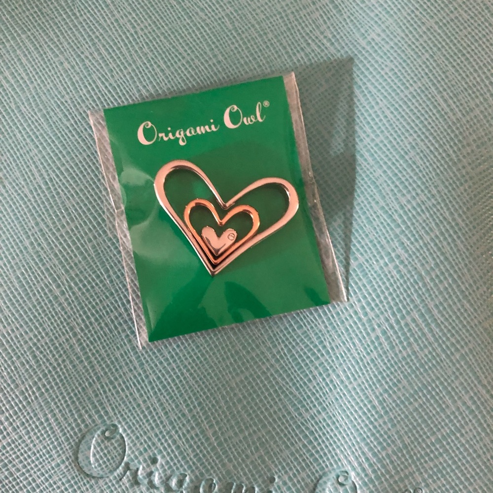 Nesting hearts with Swarovski Crystals.